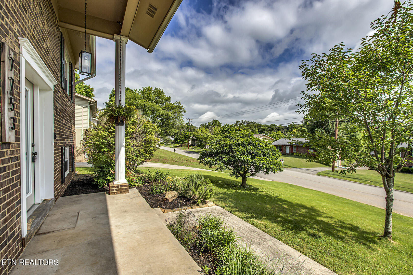 7753 Cranley Road Powell, TN 37849 - Photo 4 of 43 04_CranleyRoad_7753_FrontPorch