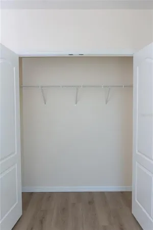 a bathroom with a sink a mirror and vanity