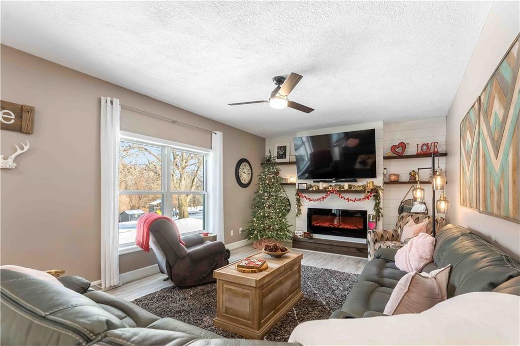 3400 Tuscarawas Road Beaver, PA 15009 - Photo 20 of 50 a living room with furniture flat screen tv and a fireplace