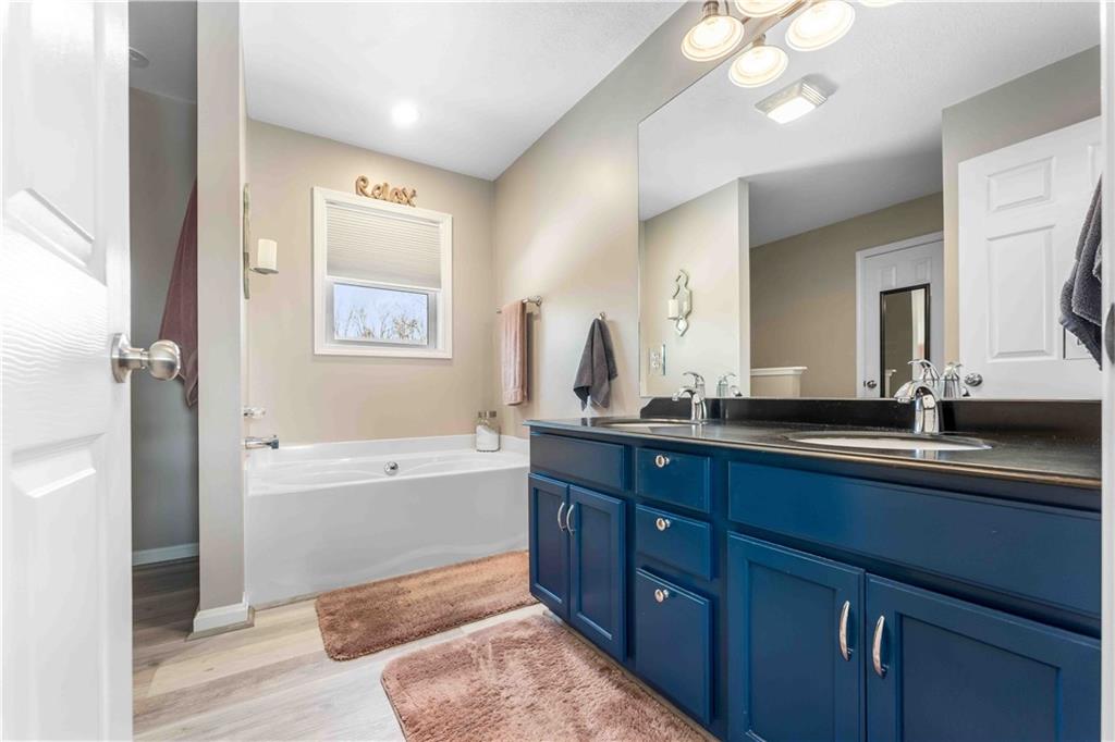 3400 Tuscarawas Road Beaver, PA 15009 - Photo 29 of 50 a spacious bathroom with a tub double sink and mirror