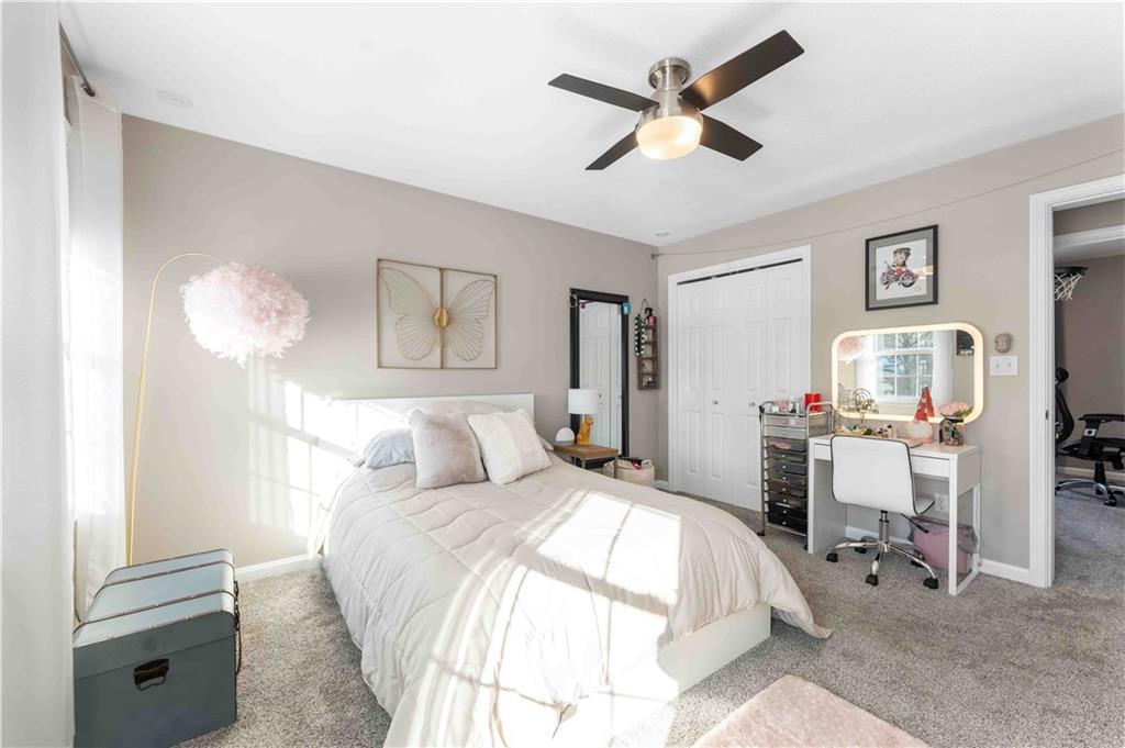 3400 Tuscarawas Road Beaver, PA 15009 - Photo 33 of 50 a bedroom with a bed and a chandelier