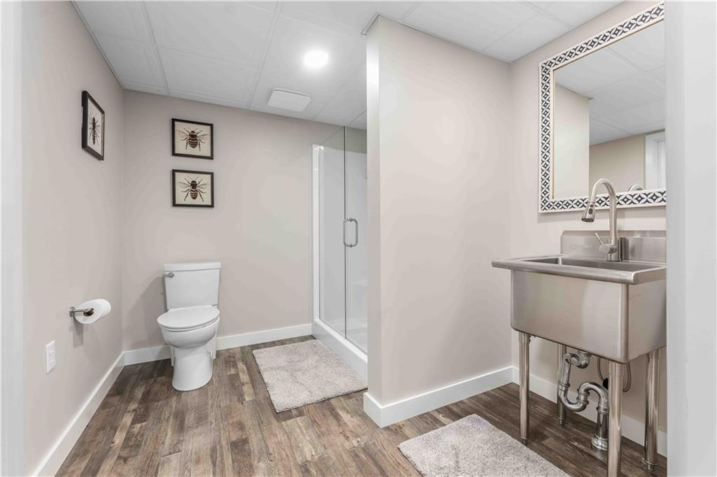 3400 Tuscarawas Road Beaver, PA 15009 - Photo 41 of 50 a bathroom with a toilet sink and mirror