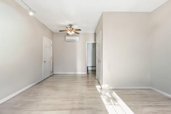 3400 Tuscarawas Road Beaver, PA 15009 - Photo 42 of 50 a view of a hallway with wooden floor and a chandelier