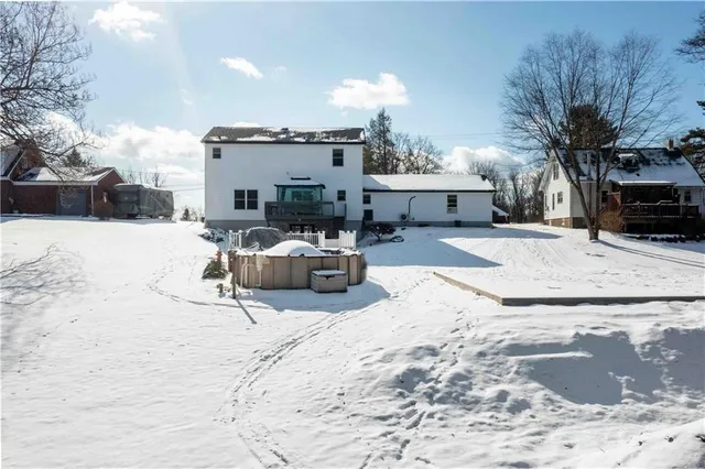 an aerial view of a house with outdoor space