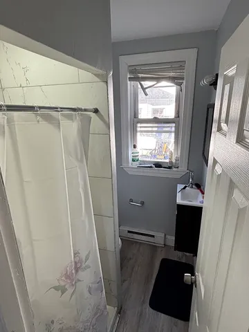 a bathroom with a sink and a shower