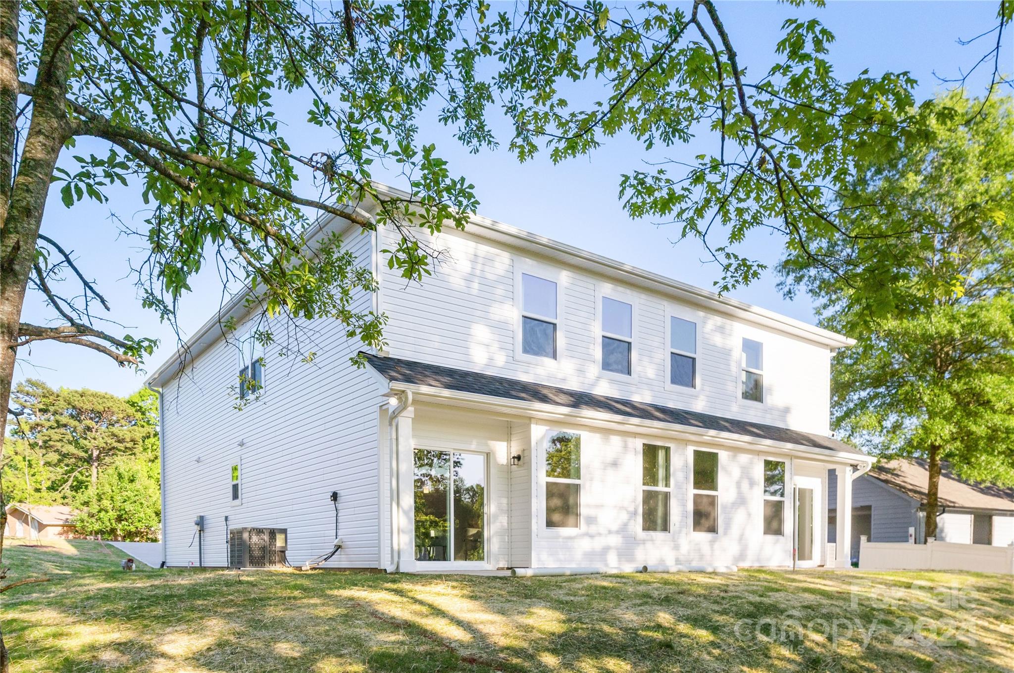 4329 Perkins Road Charlotte, NC 28269 - Photo 22 of 28 a front view of a house with a garden