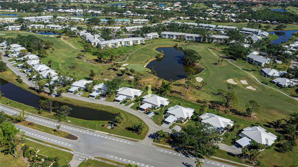 262 Cerromar Way South, Unit 53 Venice, FL 34293 - Photo 4 of 59 an aerial view of residential houses with outdoor space