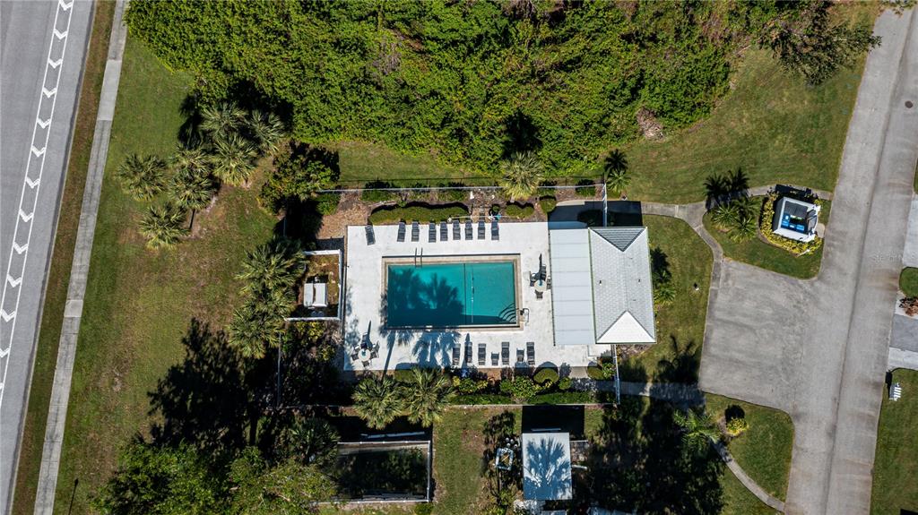 262 Cerromar Way South, Unit 53 Venice, FL 34293 - Photo 59 of 59 a sign that is on a wall next to a building