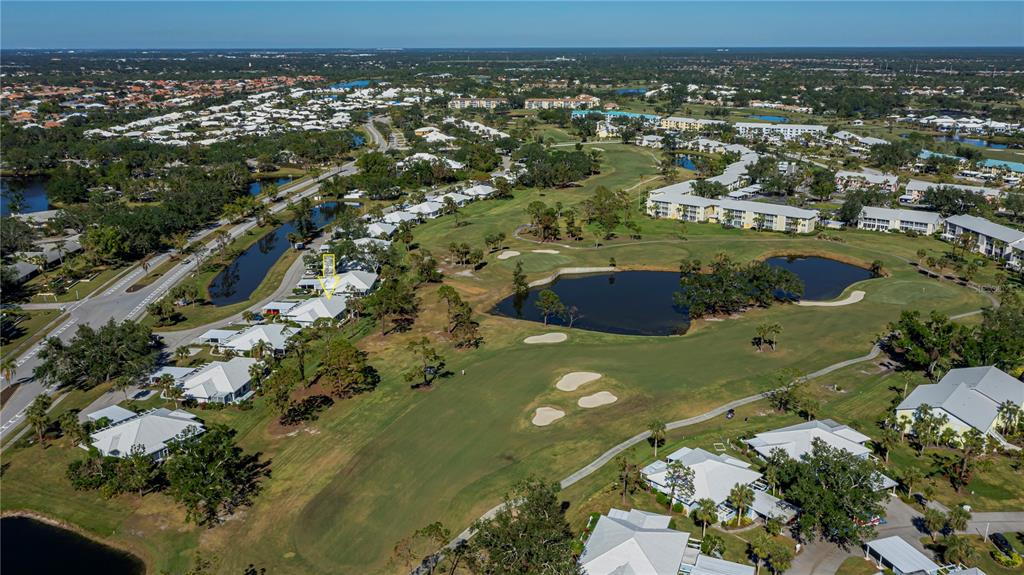 262 Cerromar Way South, Unit 53 Venice, FL 34293 - Photo 6 of 59 an aerial view of residential houses with outdoor space