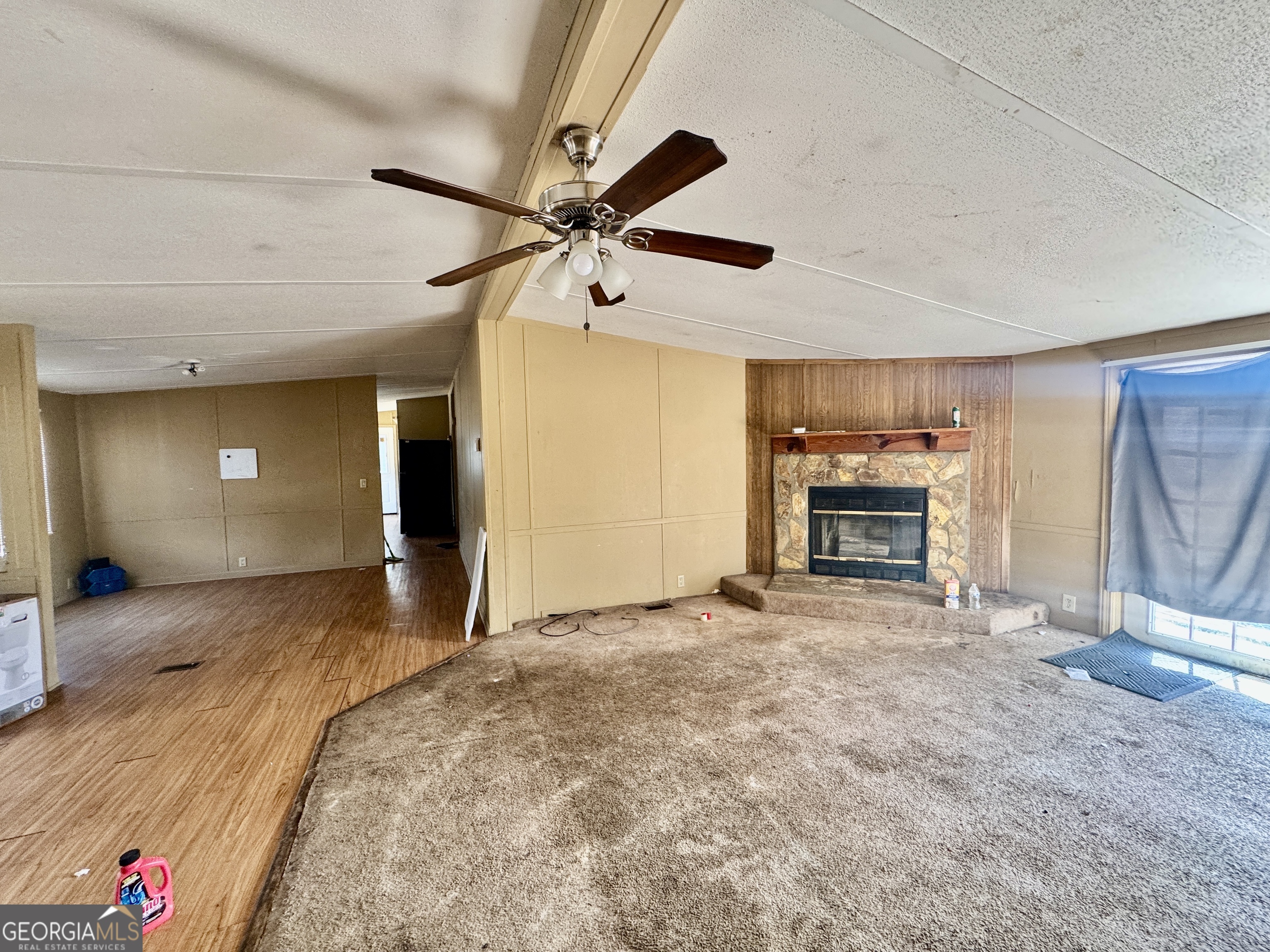 2211 New Cut Road Byromville, GA 31007 - Photo 12 of 25 a view of livingroom with hardwood floor and a ceiling fan