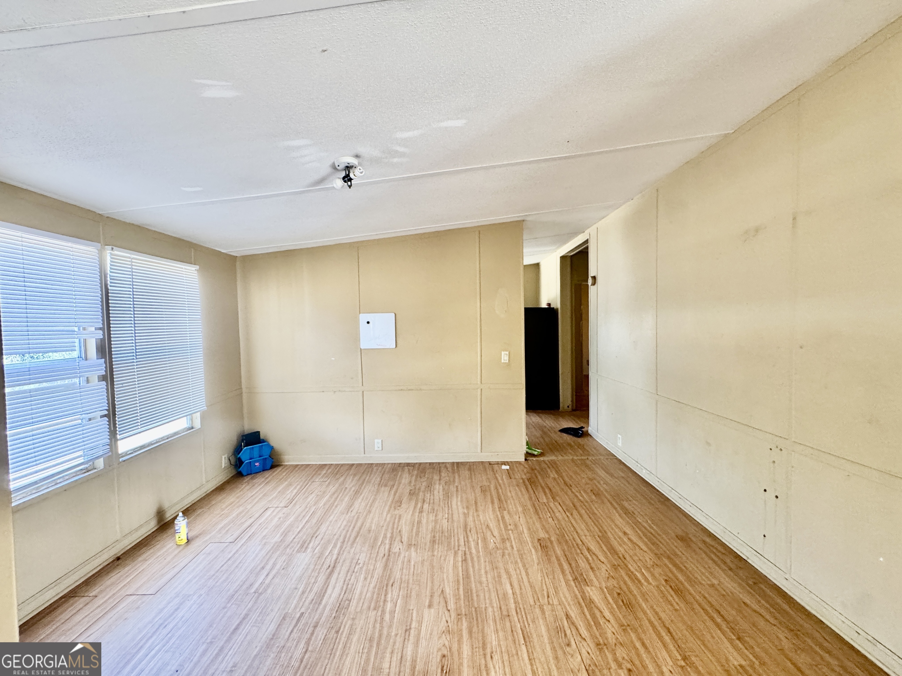 2211 New Cut Road Byromville, GA 31007 - Photo 17 of 25 a view of empty room with wooden floor