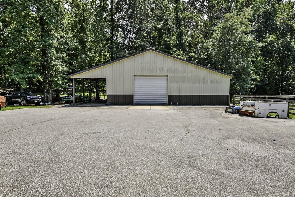 3693 Brunswick Road Bartlett, TN 38133 - Photo 11 of 30 Garage with a carport