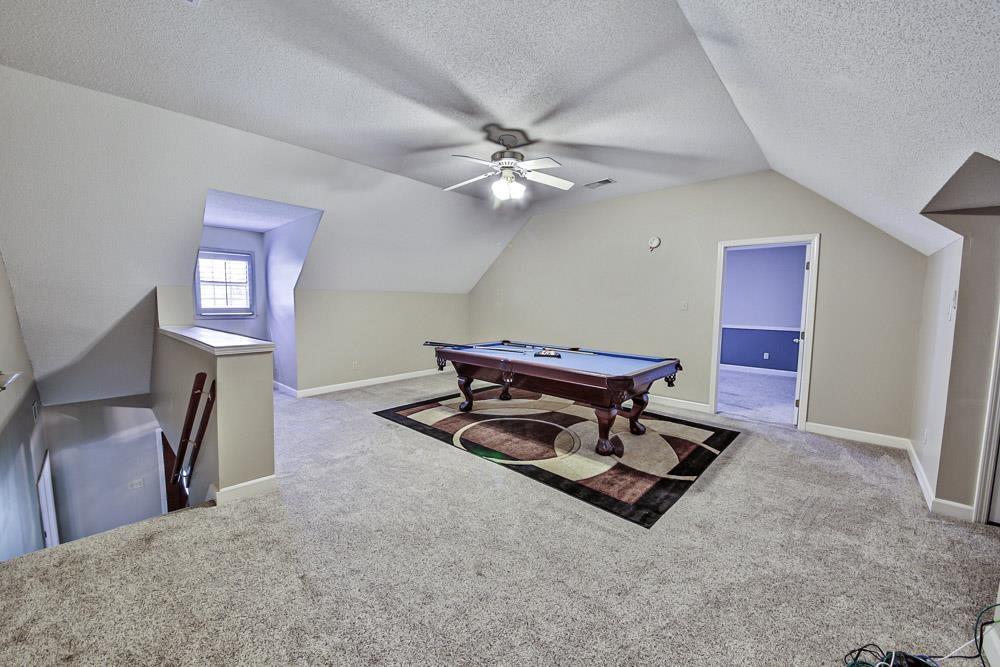 3693 Brunswick Road Bartlett, TN 38133 - Photo 24 of 30 Recreation room featuring pool table, light carpet, a textured ceiling, and lofted ceiling