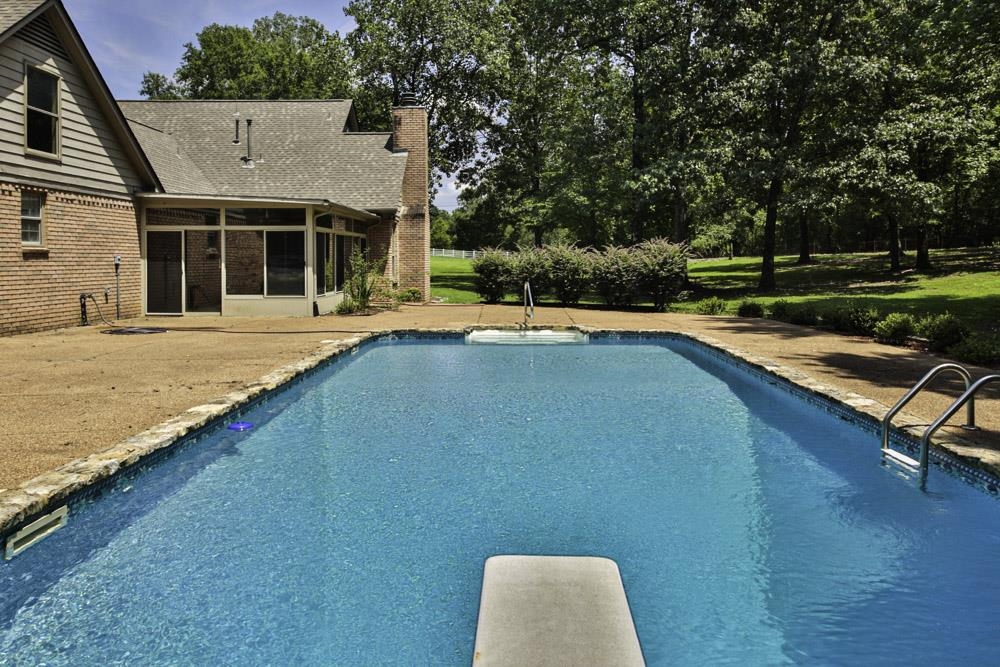 3693 Brunswick Road Bartlett, TN 38133 - Photo 30 of 30 View of swimming pool featuring a diving board