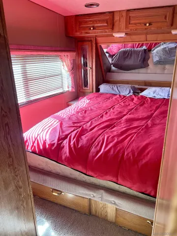 a view of a two chairs in the patio