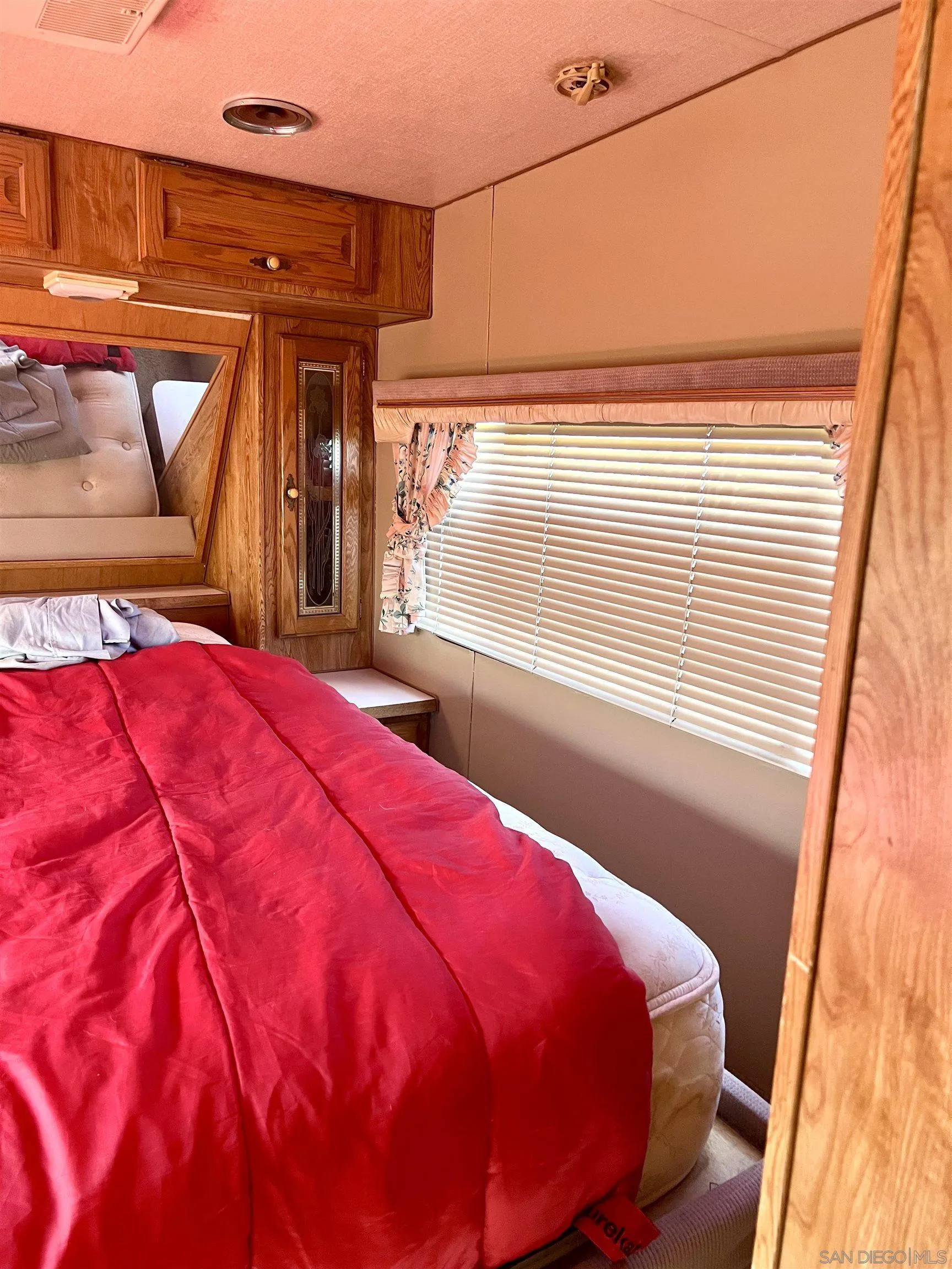 4260 Sutton Place Blythe, CA 92225 - Photo 13 of 35 a bed sitting in a bedroom next to a window