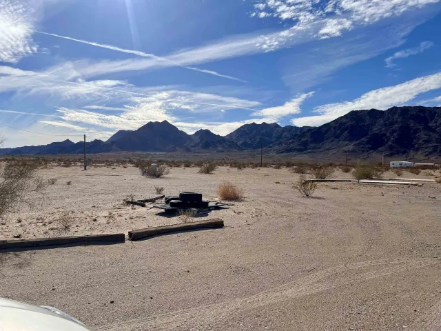 a view of a lake with a mountain