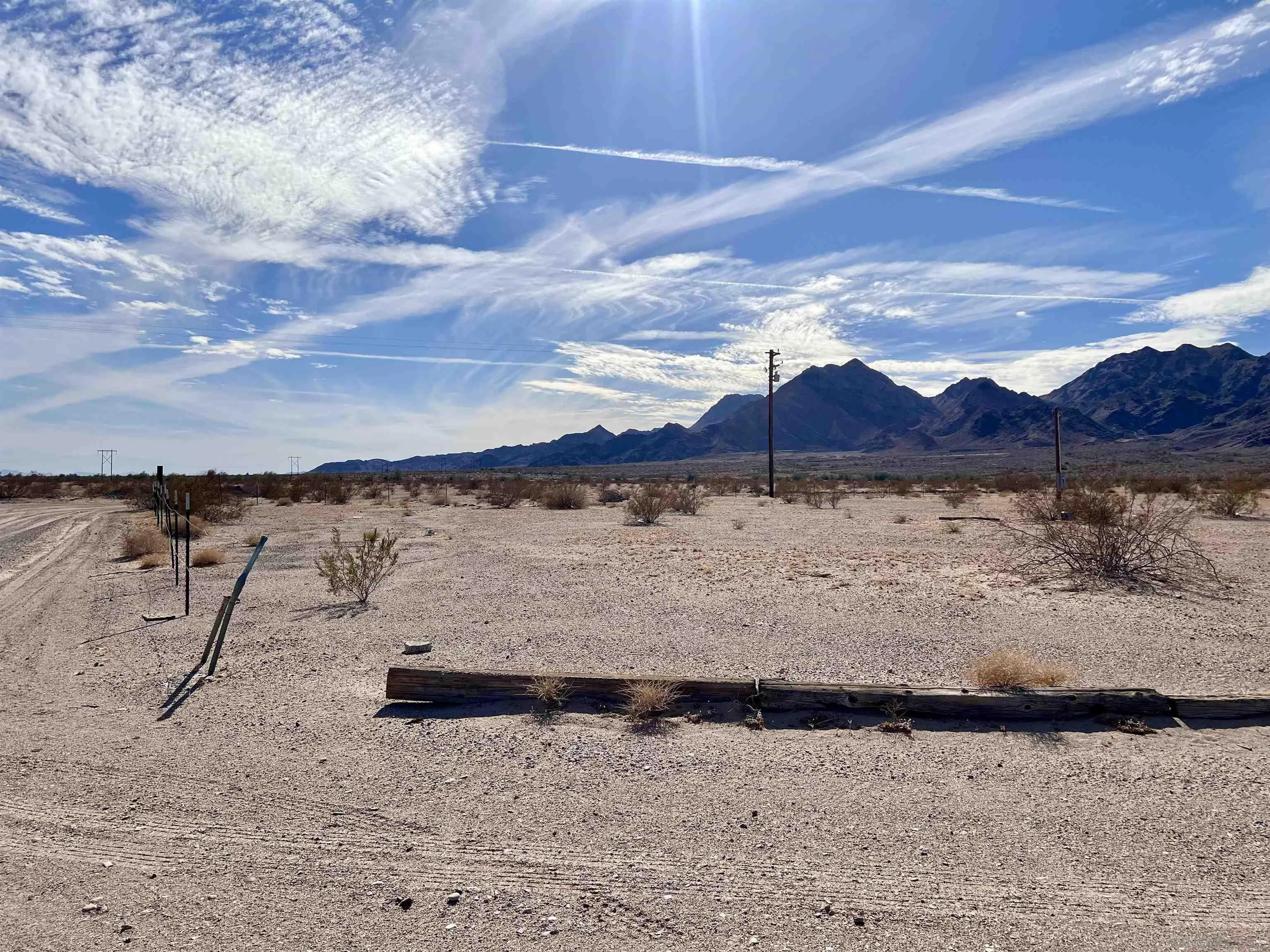 4260 Sutton Place Blythe, CA 92225 - Photo 22 of 35 a view of a lake with a mountain in the background