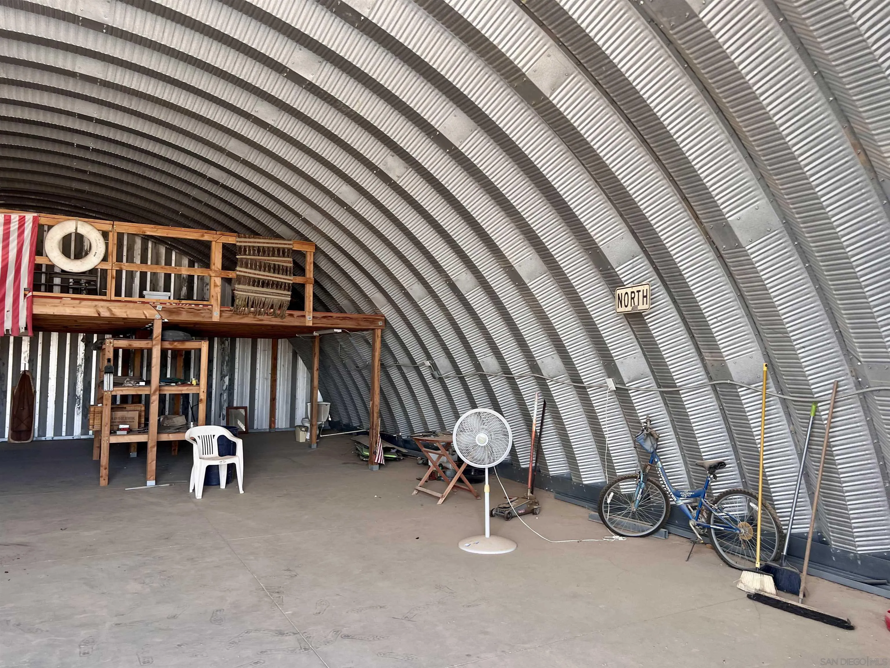 4260 Sutton Place Blythe, CA 92225 - Photo 27 of 35 a view of a patio with table and chairs and a barbeque