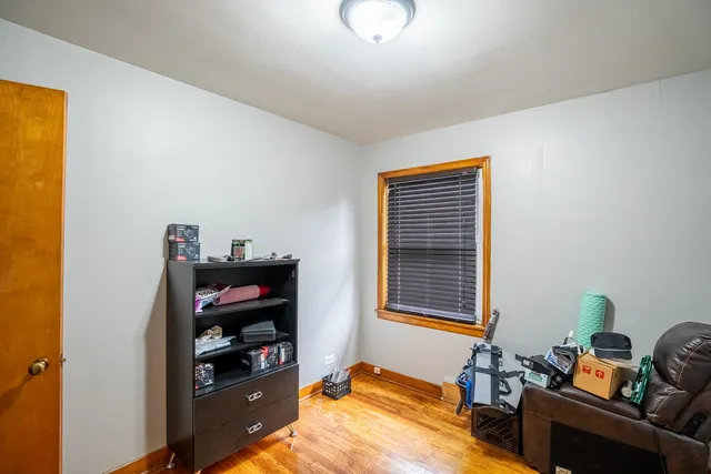 a bed room with a bed and a window