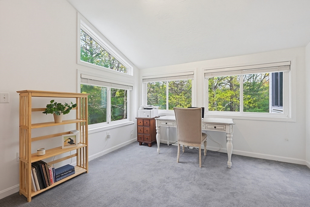 3002 Maple Brook Road, Unit 3002 Bellingham, MA 02019 - Photo 20 of 42 a view of a workspace with furniture and a window