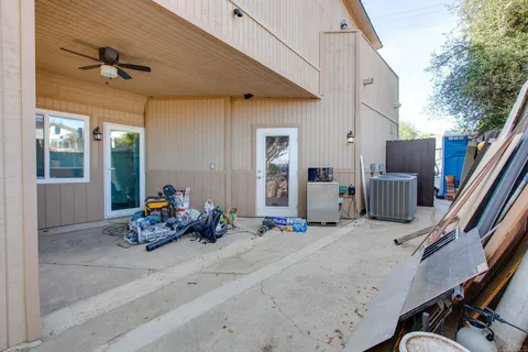 a kitchen with a sink and refrigerator