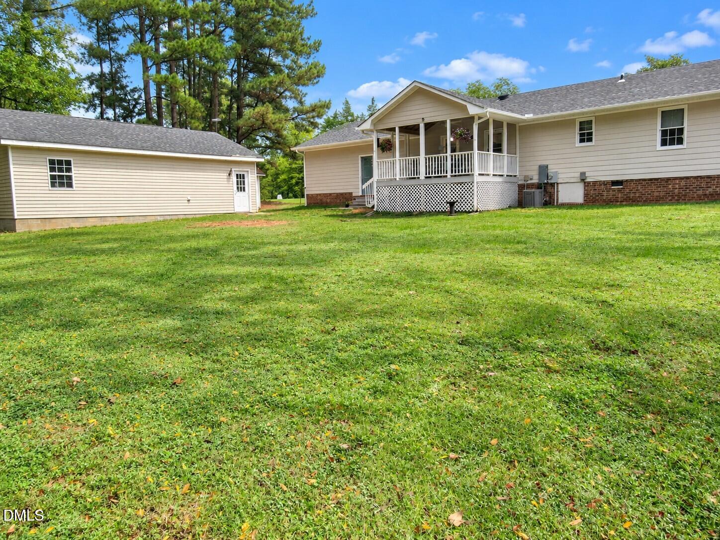 1565 Spring Valley Lake Road Henderson, NC 27537 - Photo 25 of 37 Backyard
