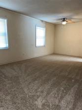 908 Cross Bend Road Plano, TX 75023 - Photo 2 of 11 an empty room with windows and closet