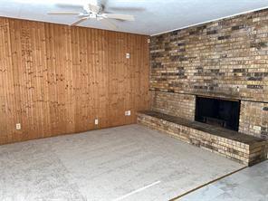 908 Cross Bend Road Plano, TX 75023 - Photo 3 of 11 a view of empty room with fireplace