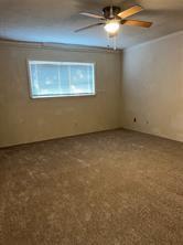 908 Cross Bend Road Plano, TX 75023 - Photo 4 of 11 an empty room with a window