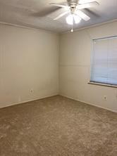 908 Cross Bend Road Plano, TX 75023 - Photo 6 of 11 a view of an empty room with a window
