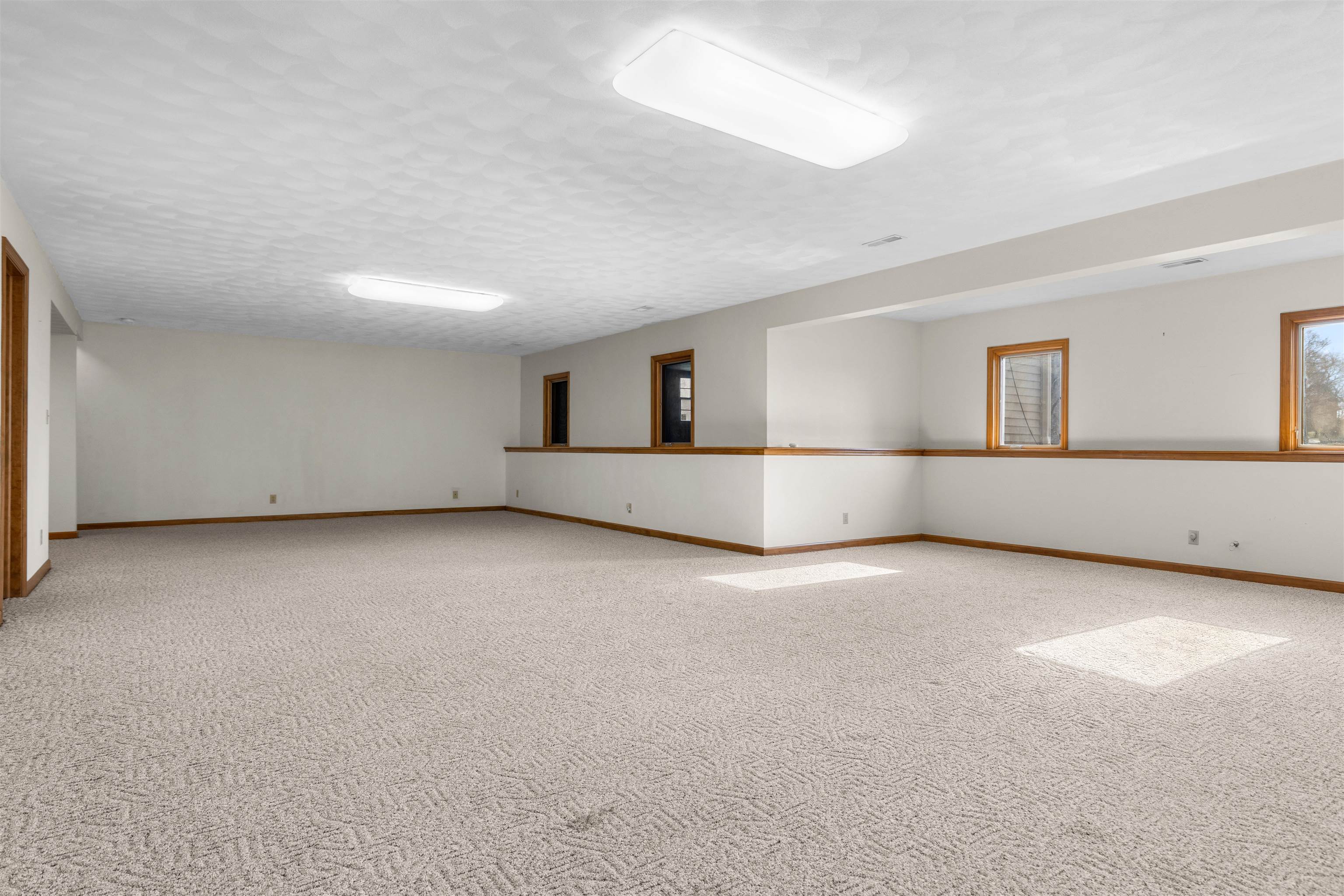 8317 Snaresbrook Road Roscoe, IL 61073 - Photo 27 of 45 a view of an empty room with a window