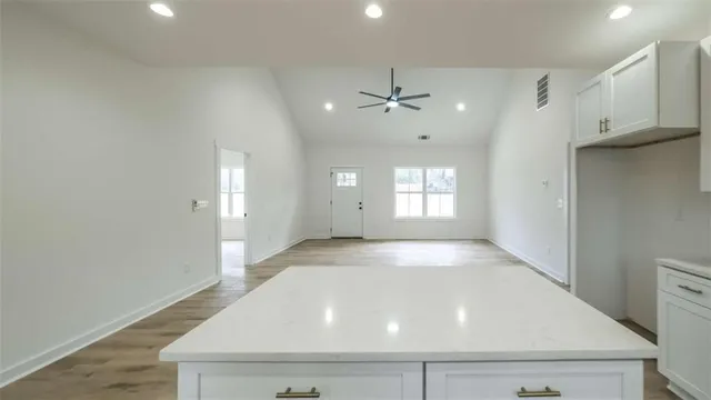 a view of an empty room and window