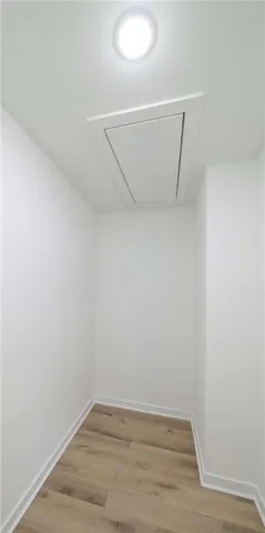 a view of small space with racks on the wall