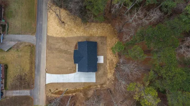 an aerial view of residential house with outdoor space