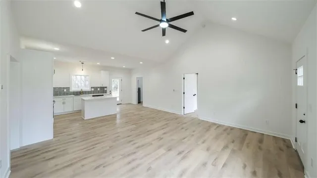 a view of kitchen with wooden floor