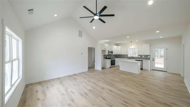 a view of kitchen with wooden floor