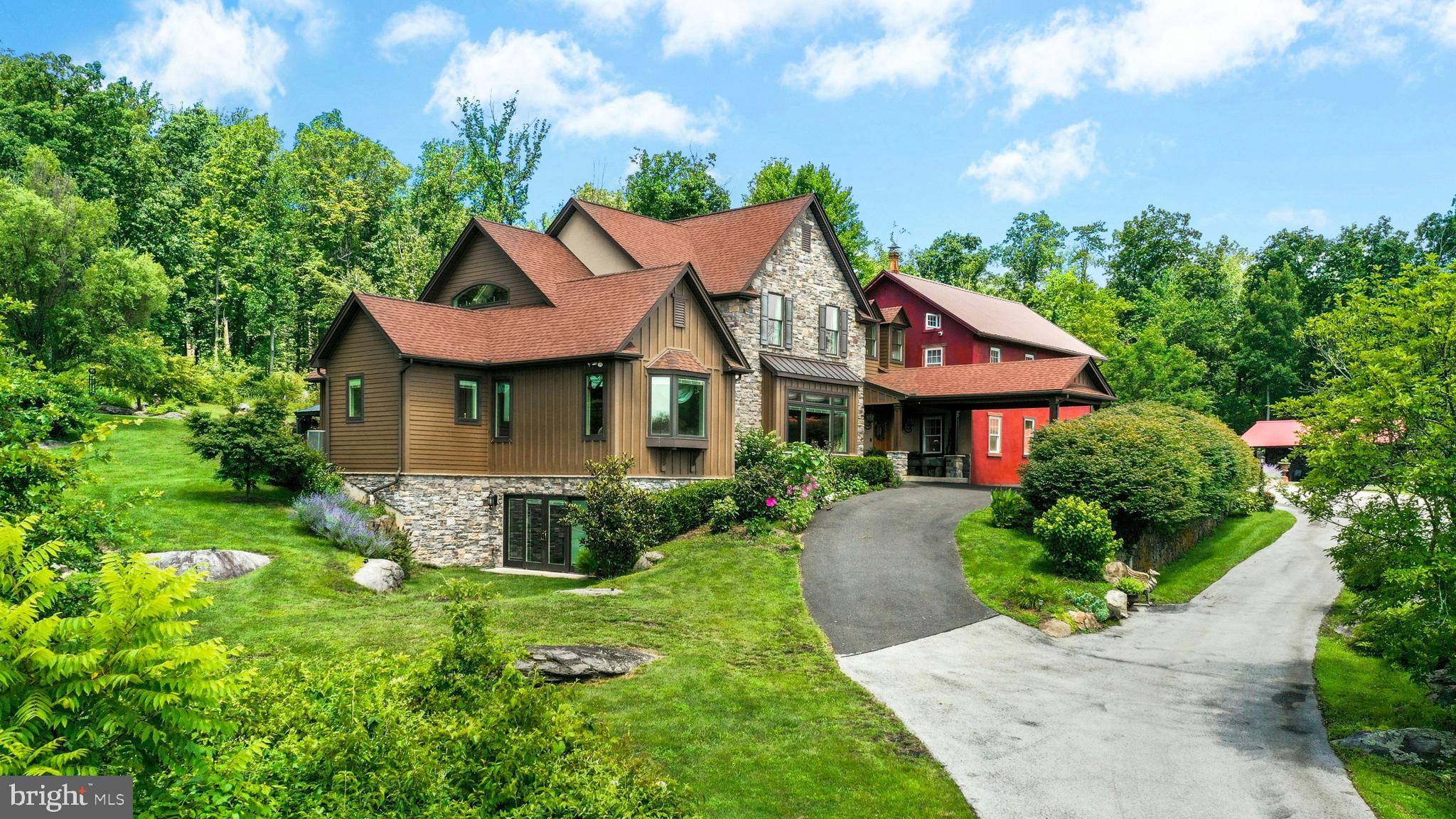 1305 Ridge Valley Road Sellersville, PA 18960 - Photo 3 of 59 a front view of a house with a garden