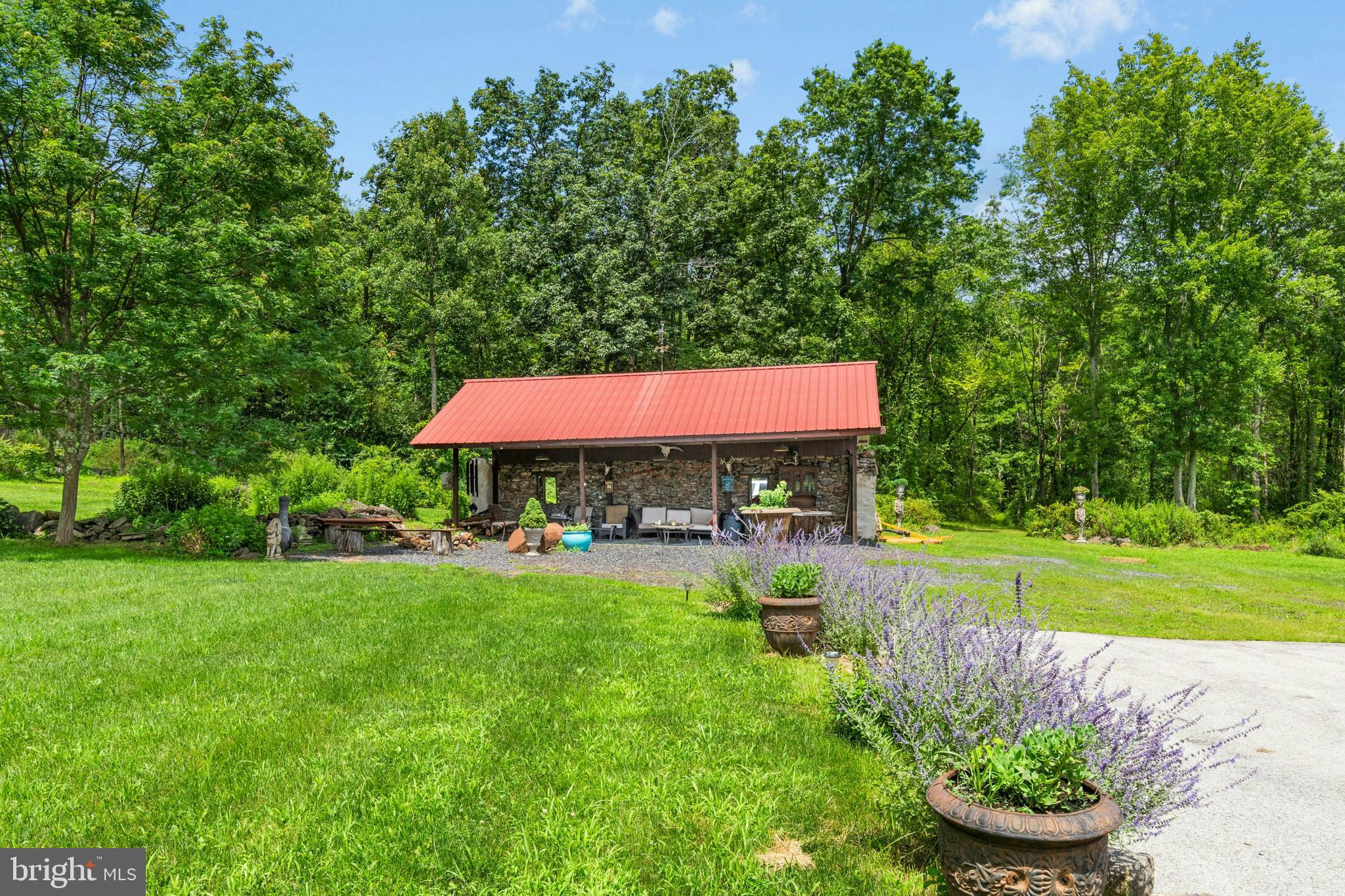 1305 Ridge Valley Road Sellersville, PA 18960 - Photo 49 of 59 a view of a house with a yard and sitting area