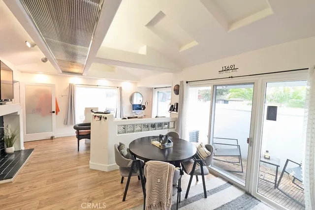 a living room with furniture a rug and a flat screen tv