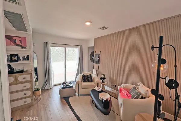 a bathroom with a sink mirror and vanity