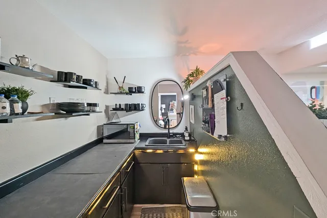 a view of entryway with a flower garden