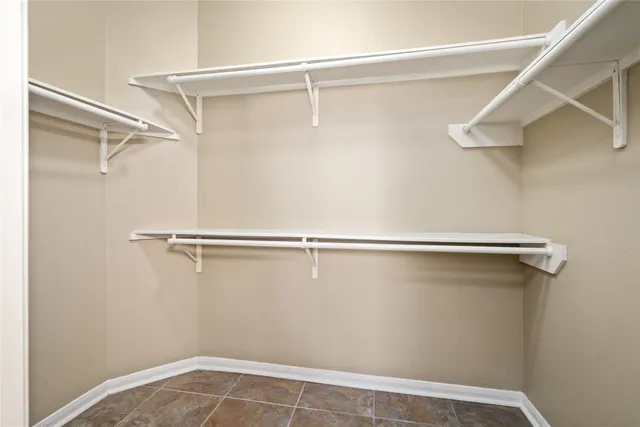 a view of a room with racks on the wall