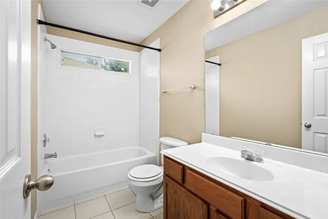 a bathroom with a sink a toilet and a bathtub