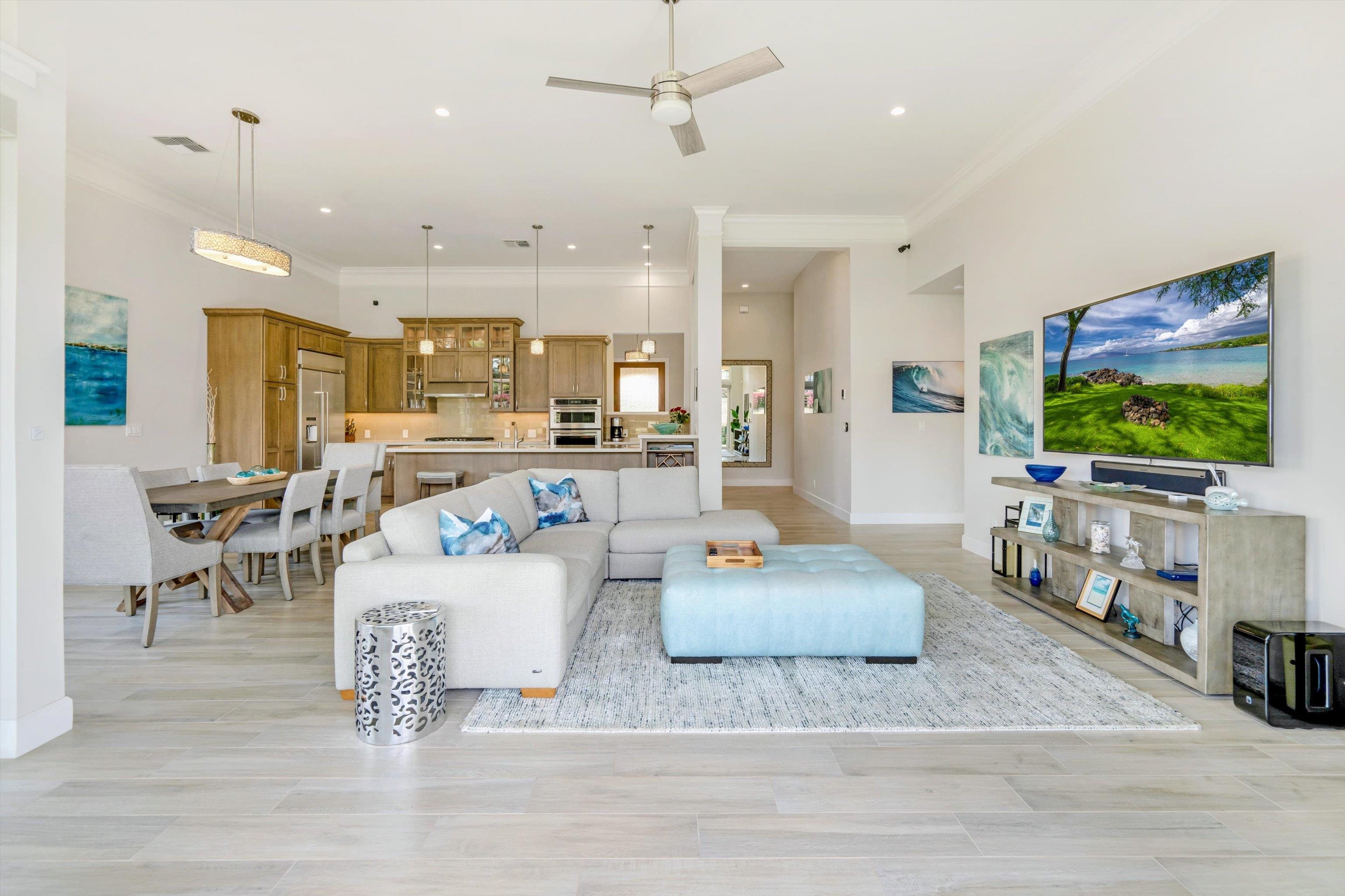 1323 Umeke Circle, Unit 102 Kihei, HI 96753 - Photo 13 of 50 a living room with furniture and a flat screen tv