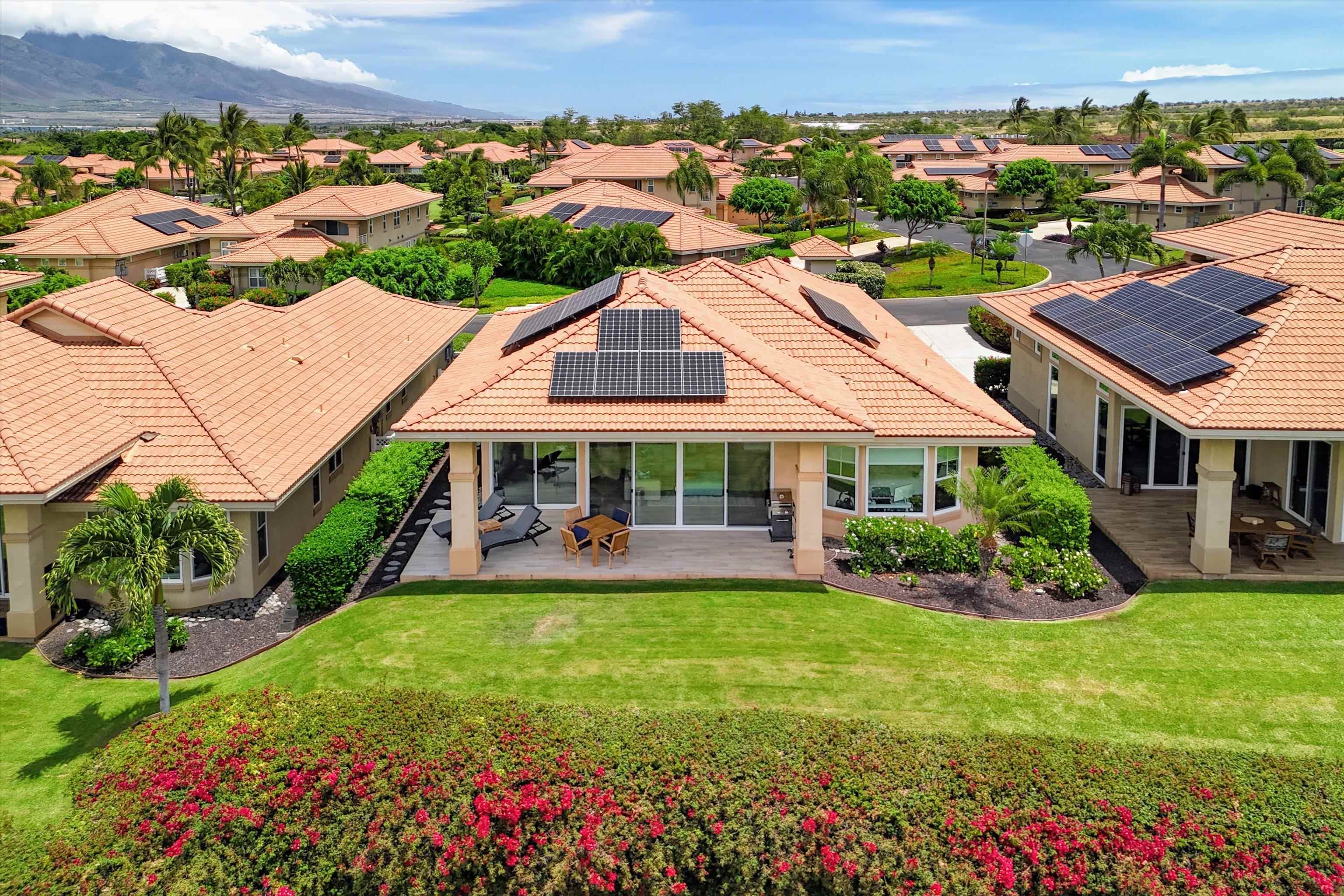 1323 Umeke Circle, Unit 102 Kihei, HI 96753 - Photo 37 of 50 an aerial view of a house with garden space and street view