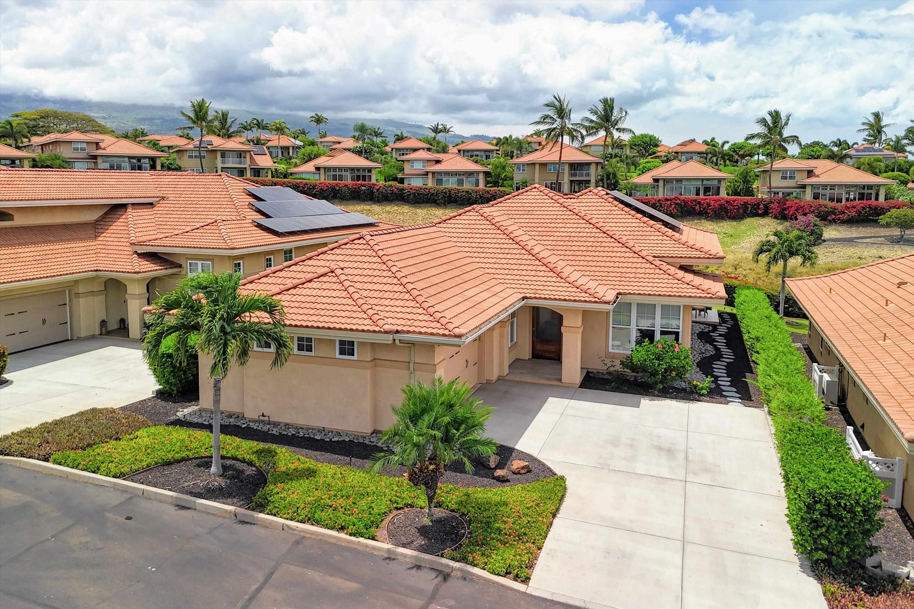 1323 Umeke Circle, Unit 102 Kihei, HI 96753 - Photo 38 of 50 a aerial view of a houses with yard