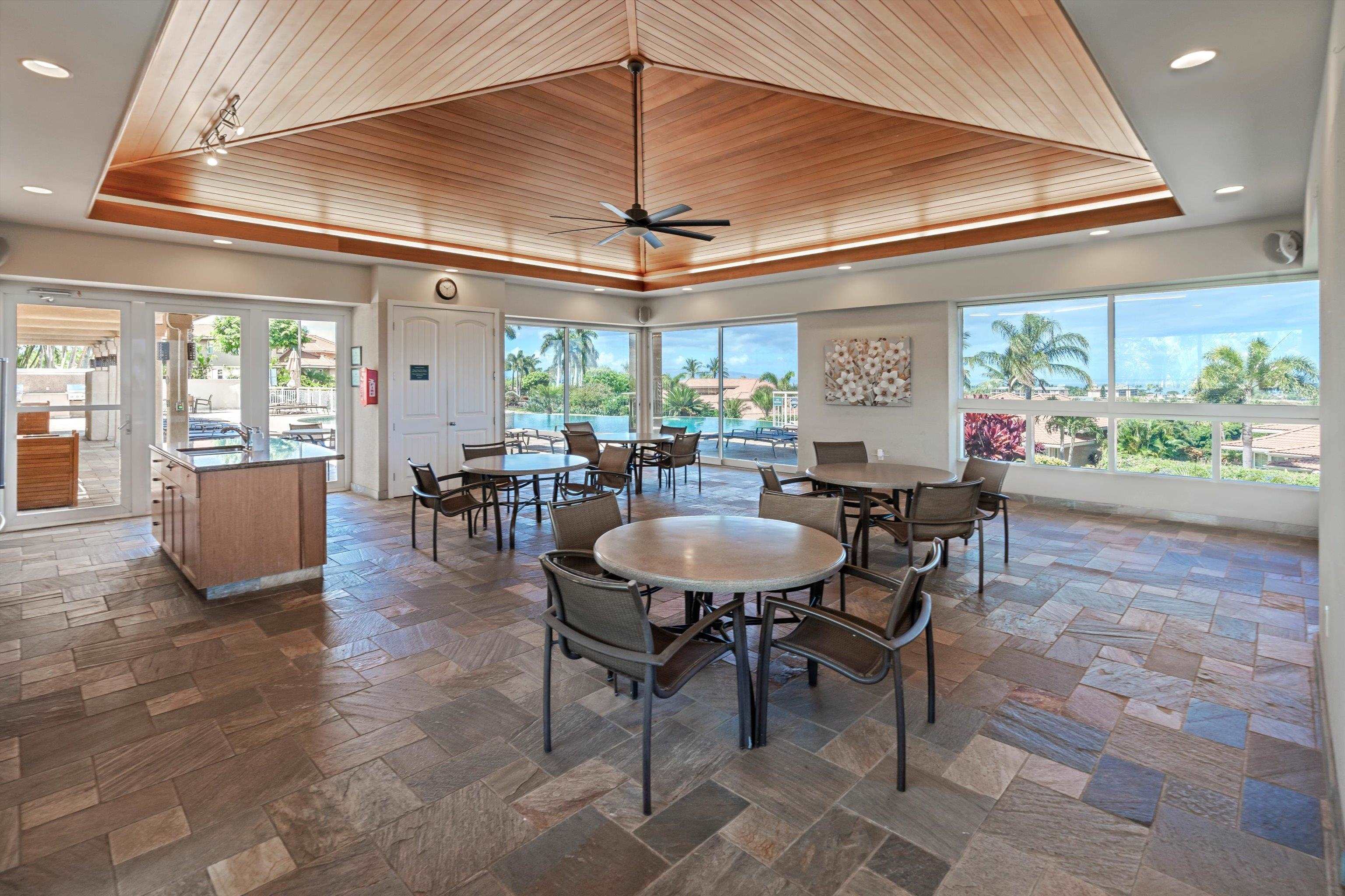 1323 Umeke Circle, Unit 102 Kihei, HI 96753 - Photo 42 of 50 a view of a dining room with furniture window and outside view