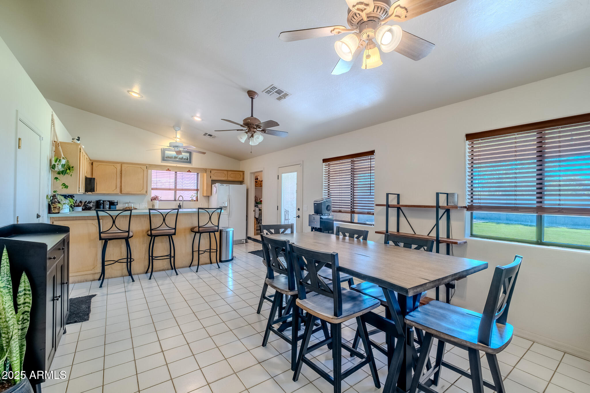 841 East Granada Avenue Apache Junction, AZ 85119 - Photo 15 of 33 a view of a dining room with furniture and window
