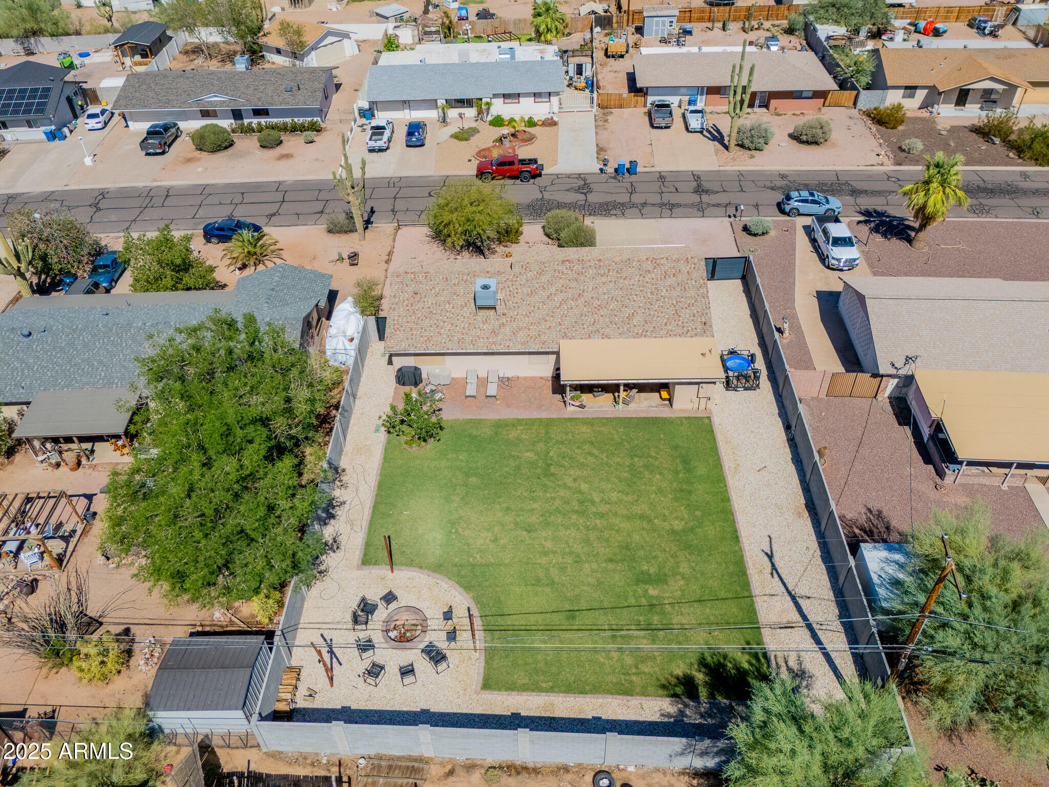 841 East Granada Avenue Apache Junction, AZ 85119 - Photo 32 of 33 an aerial view of a house with a yard